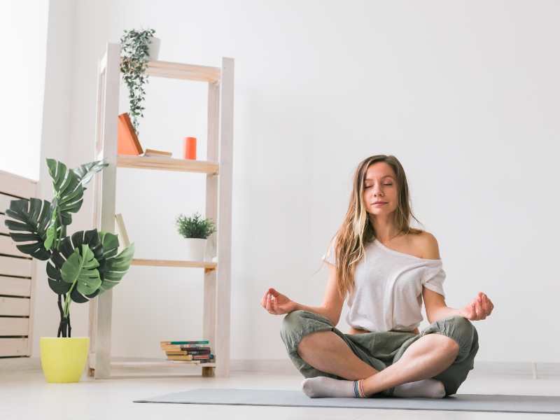 woman-sitting-trying-to focus-as-self-care-practice-for-mothers