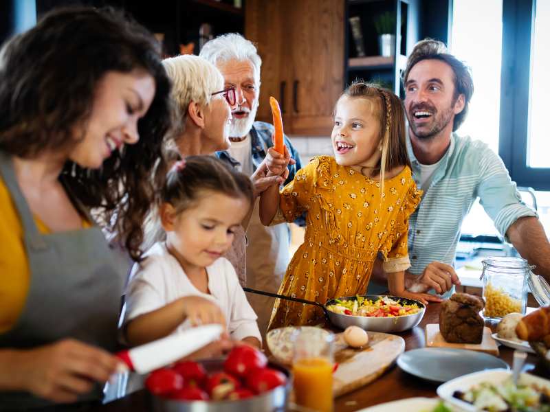 woman-spending-time-with-family-on-the-table