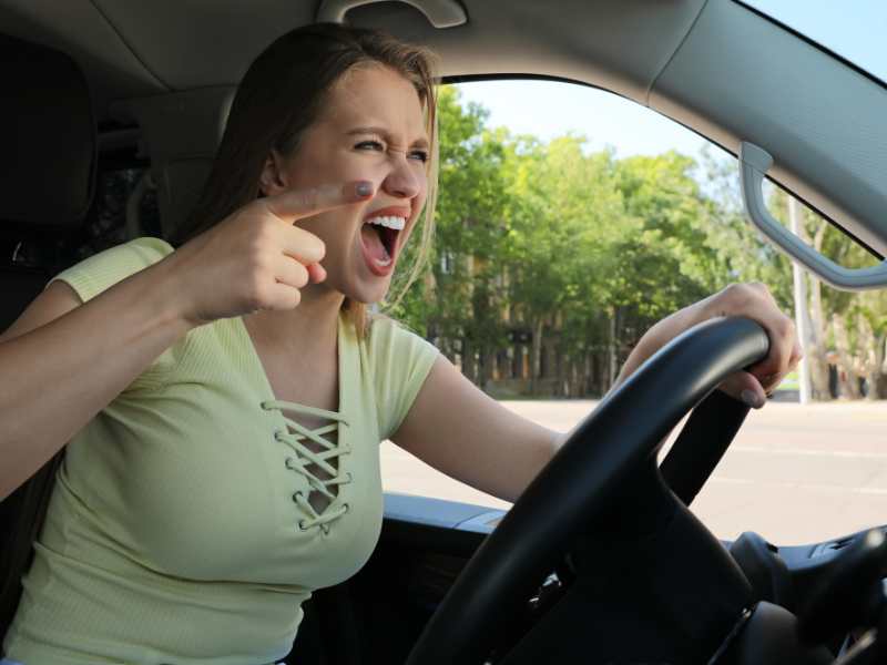 woman-driving-and-shouting