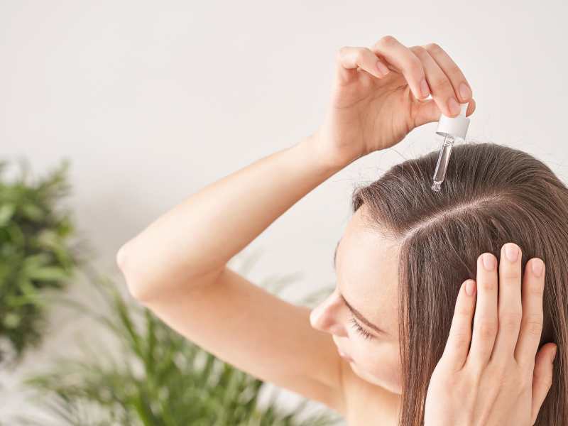 woman-conditioning-her-hair-a-tip-for-maintaining-a-healthy-hair