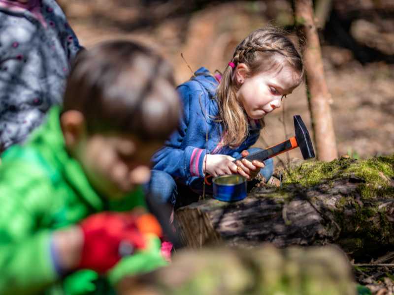 kids-playing-and-having-a-creative-time-in-nature