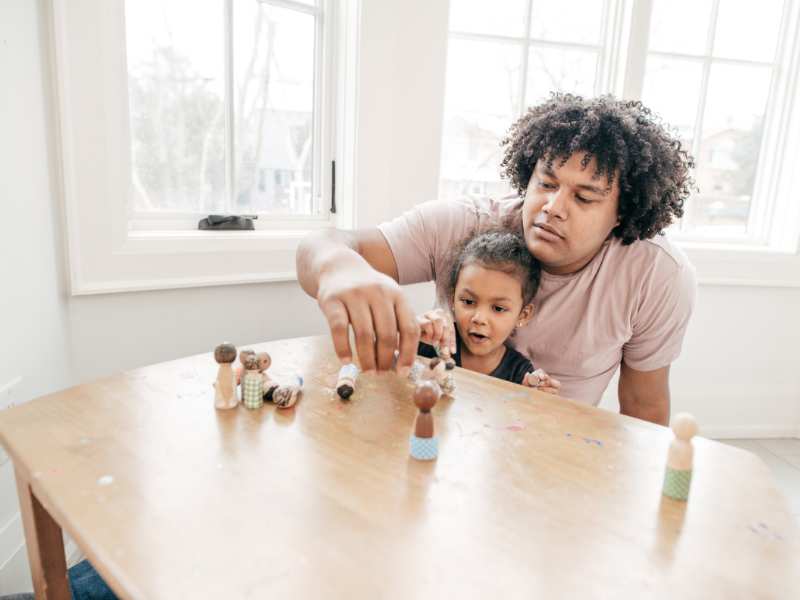 a-little-boy-with-dad-by-the-table