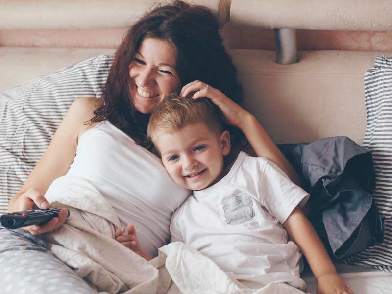 a-mom-relaxing-with-her-little-son