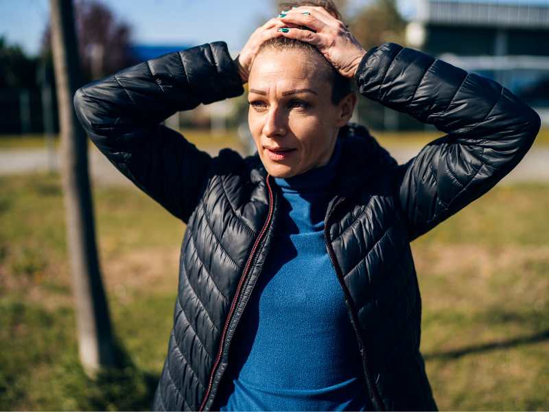 woman-trying-to-protect-her-hair-from-direct-sun