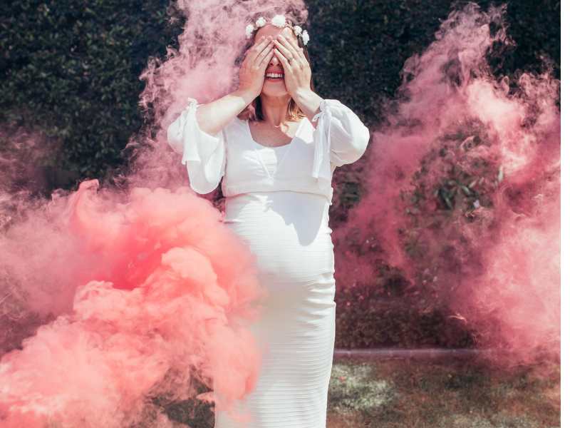 pregnant-woman-on-white-creative-Halloween-gender-reveal-for-2024