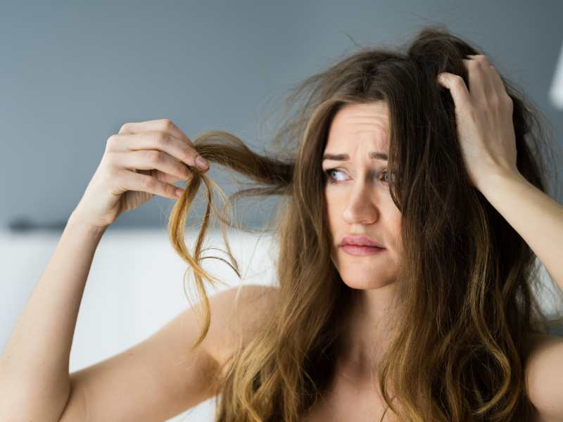 woman-with-shredding-and-messy-hair