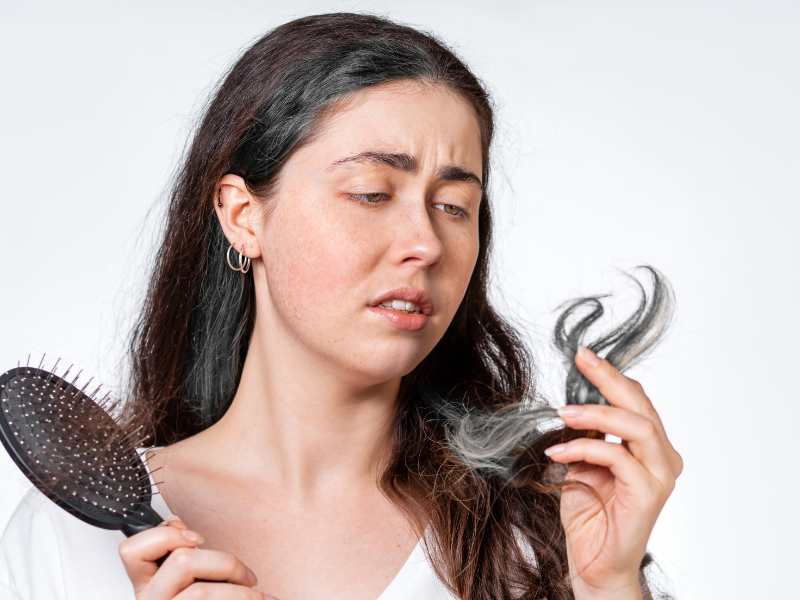 woman-experiencing-hair-loss-as-a-result-of-hormonal-imbalances-from-stress