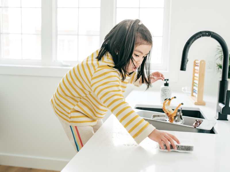 little-girl-scrubbing-her-mess