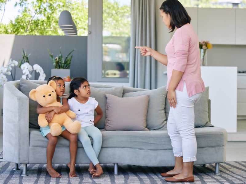 two-little-girls-actively-listening-to-mom-while-she-instructs-without-yelling