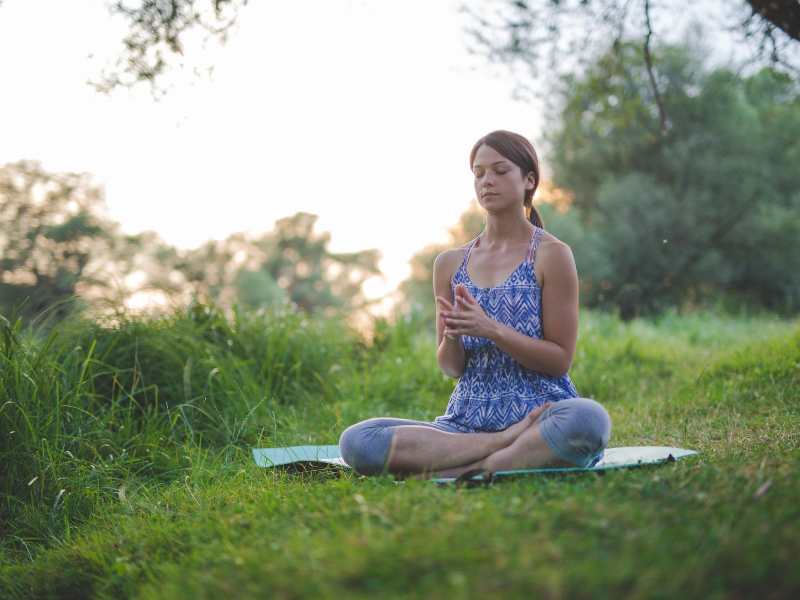 woman-in-the-field-relaxing-to-calm-down-to-avoid-yelling-at-kids