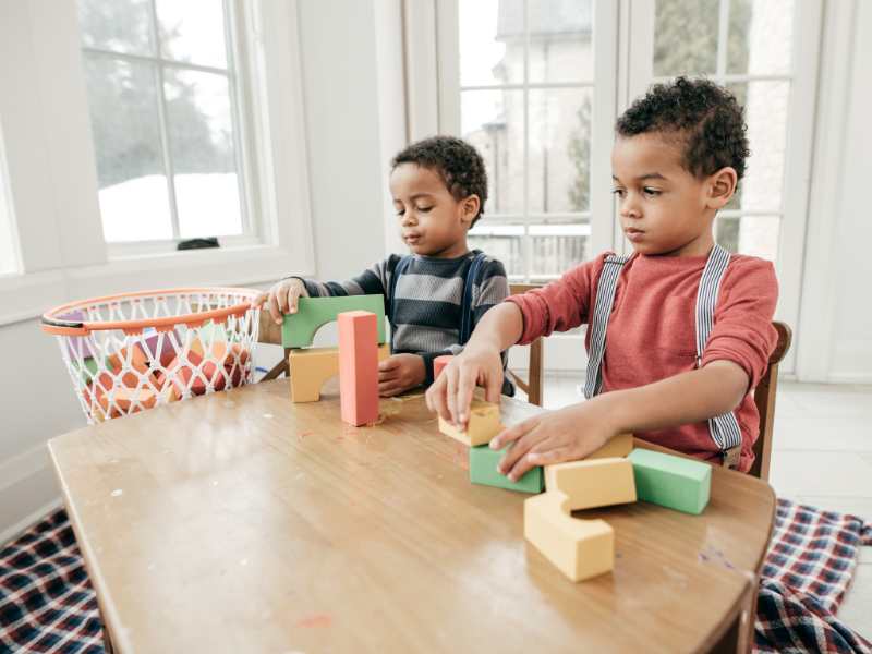 two-little-boys-fixing-their-blocks