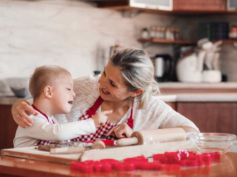 mom-in-the-kitchen-showing-care-to-special-need-child