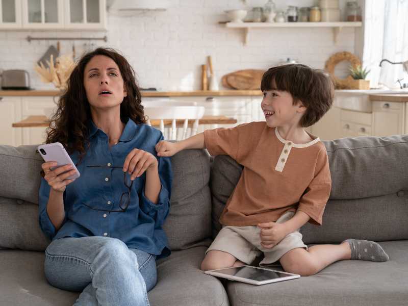 woman-trying-to-make-son-feel-good-without-yelling