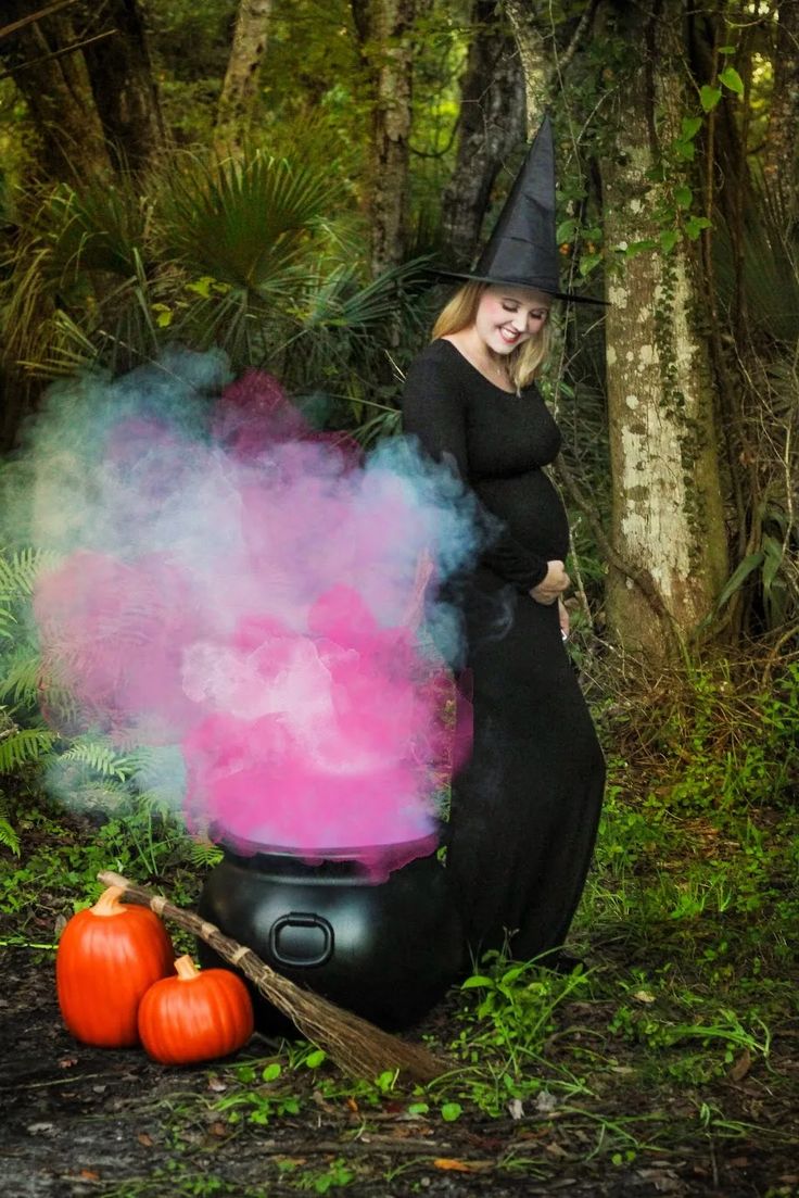 pregnant-woman-on-black-by-cauldron-smoke