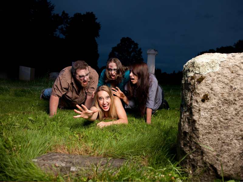 woman-with-family-on-graveyard-gala