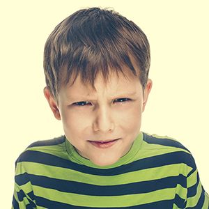 little-boy-on-green-and-black-polo