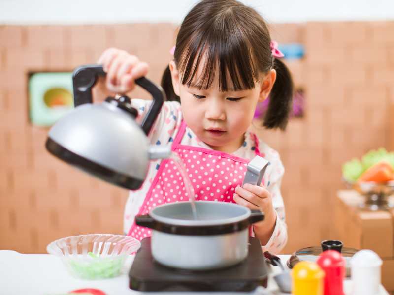 toddler-girl-pretend-play-food-preparing-a-safe-indoor-actitivities-for-toddlers