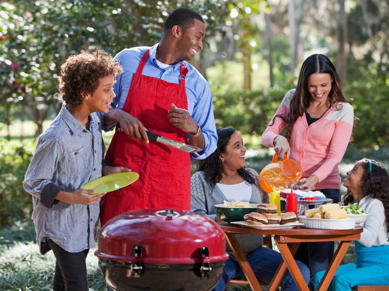 a-family-cookout-with-BBQ-set-outside-a-good-christmas -gift-idea