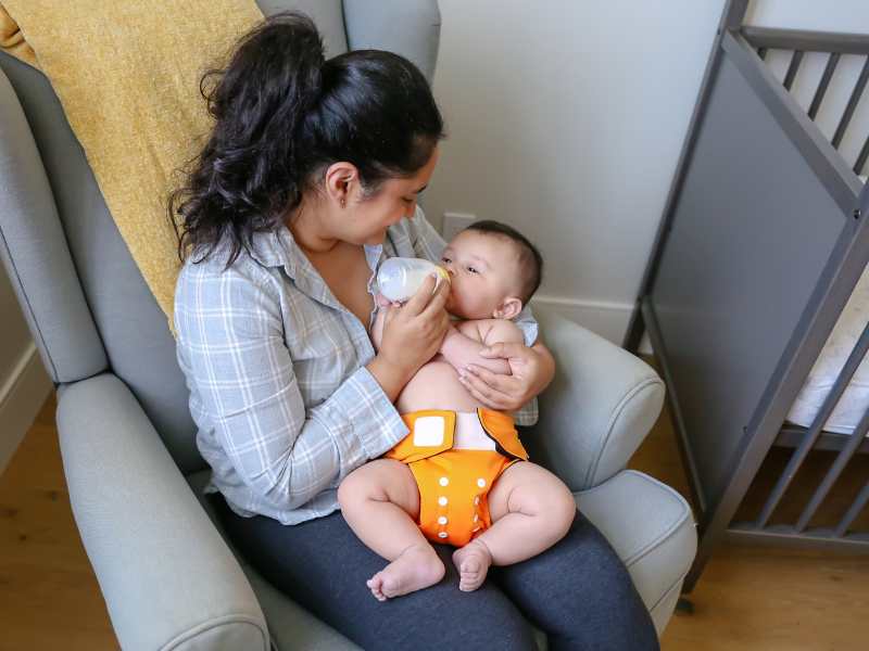 a-mom-feeding-baby-with-bottle