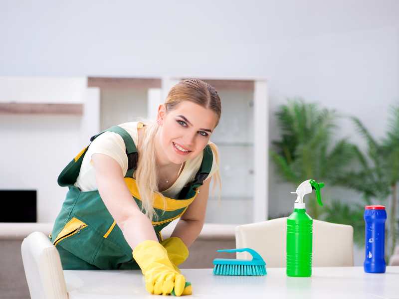 woman-with-yellow-gloves-doing-her-cleaning-routines