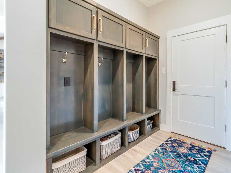 a-mudroom-with-brown-woods-for-maintaining-a-well-organized-home