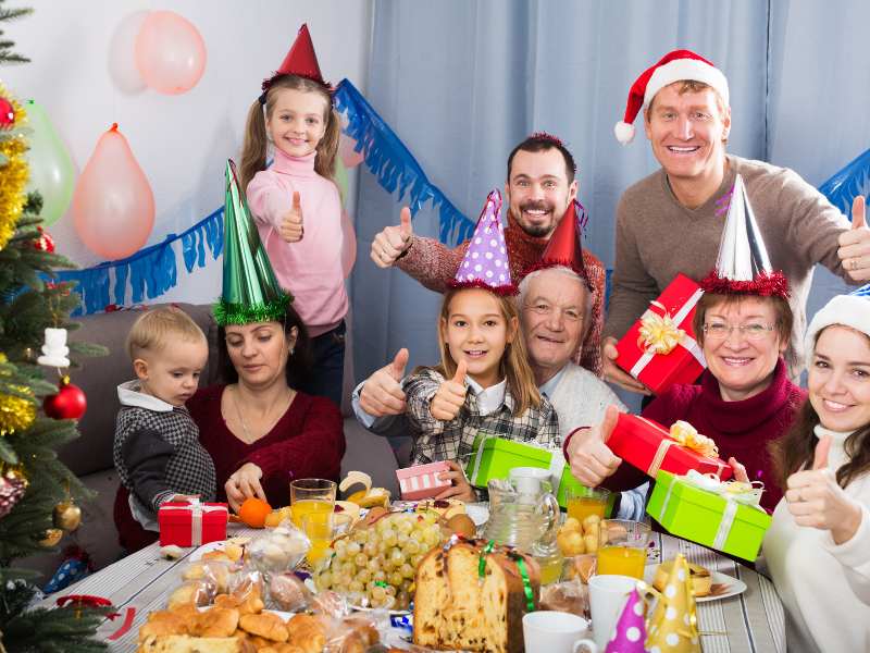 whole-family-on-table-with-Christmas-gifts