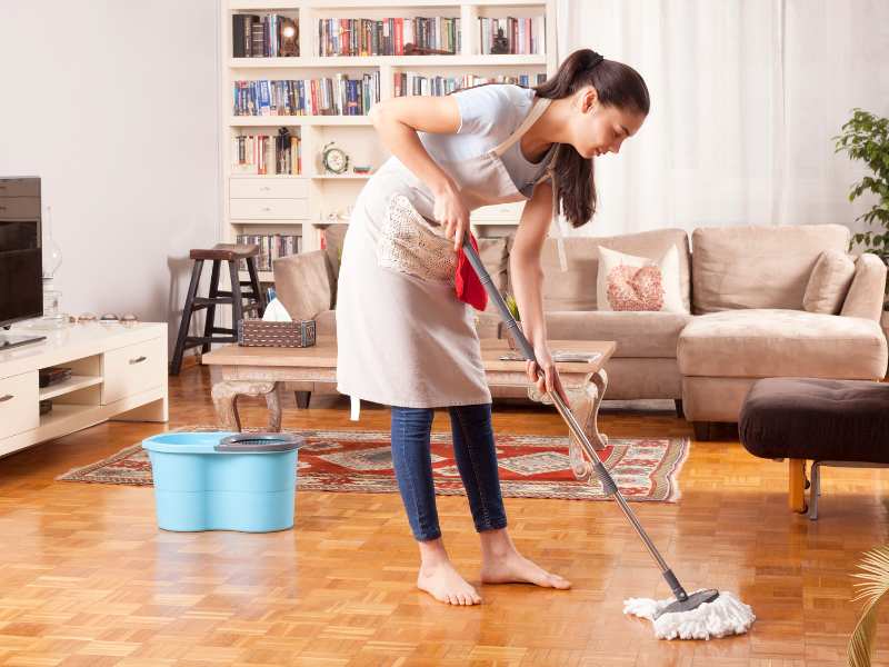 young-woman-mopping-floor