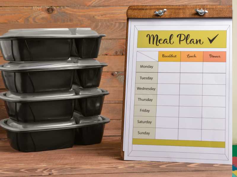 containers-with-healthy-food-and-meal-plan-on-wooden-background