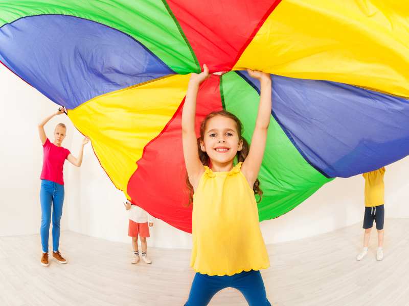 children-playing-with-parachute-indoor