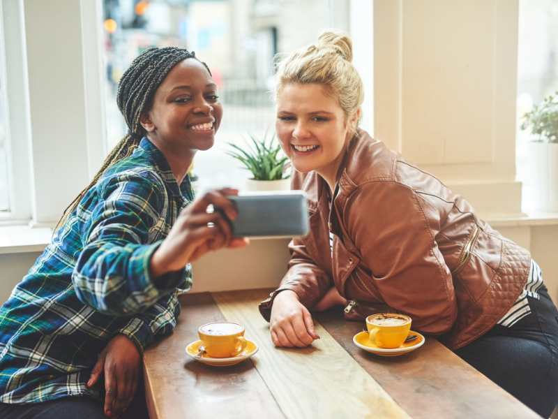 two-women-with-mobile-phone