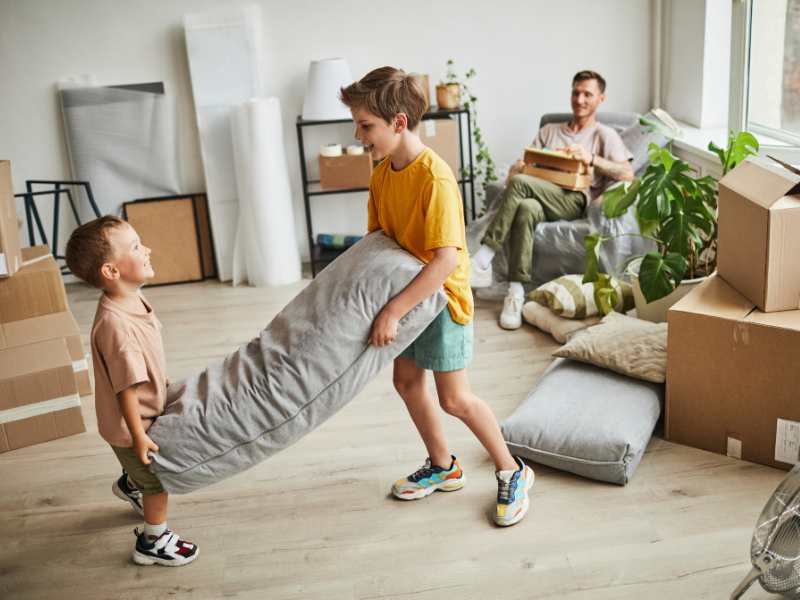 two-boys-playing-pillow-fort-in-the-room