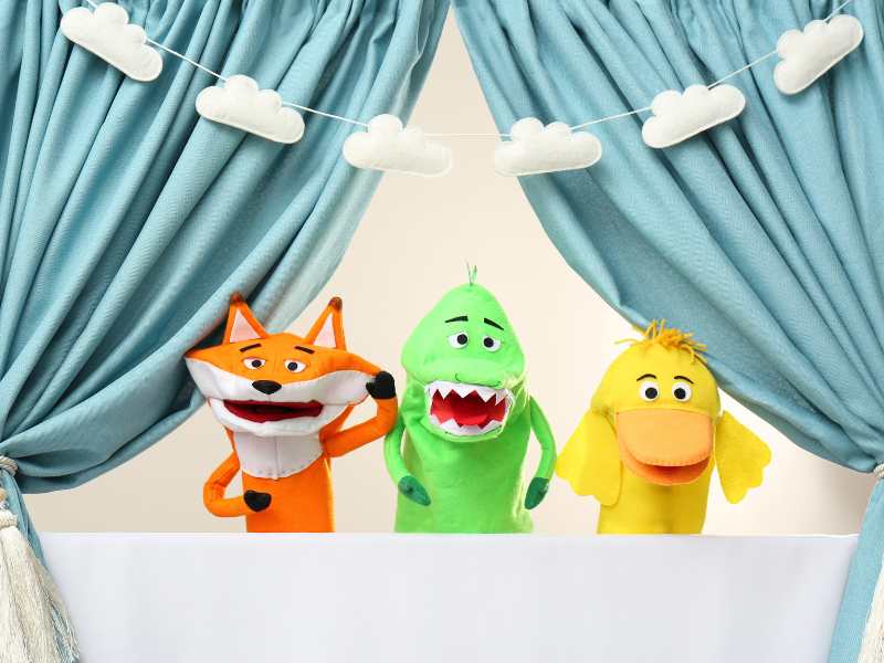 creative-puppet-show-on-white-stage-indoors