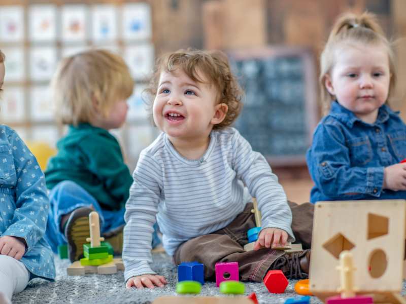 toddlers-playing-with-sticky-notes