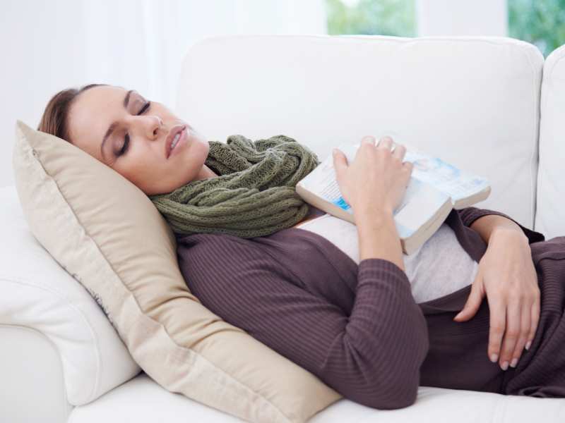 a-young-woman-taking-a-nap-on-the-sofa