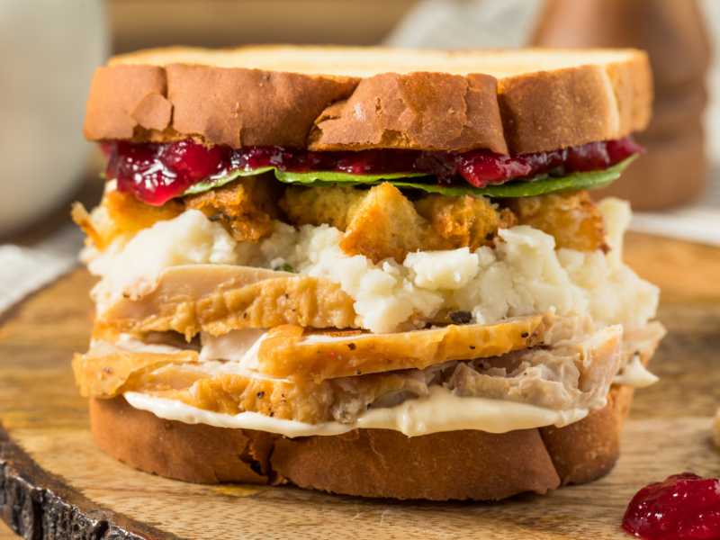 homemade-thanksgiving-leftover-turkey-sandwich-with-cranberry-stuffing-and-potatoes