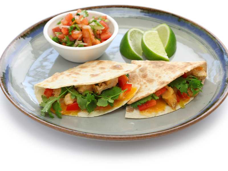 veggie-Quesadillas-in-a-wrap-on-a-flat-white-plate-a-easy-weeknight-dinner-idea