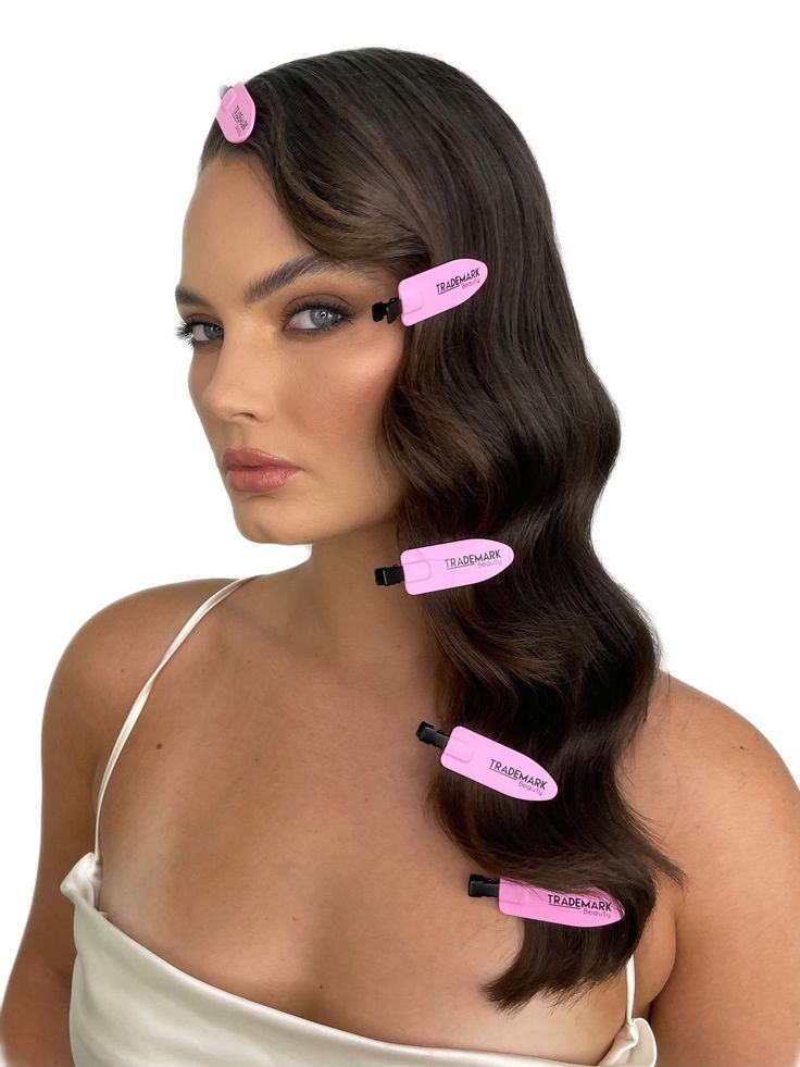 young-woman-with-curled-ends-with-pink-clips-hairstyle