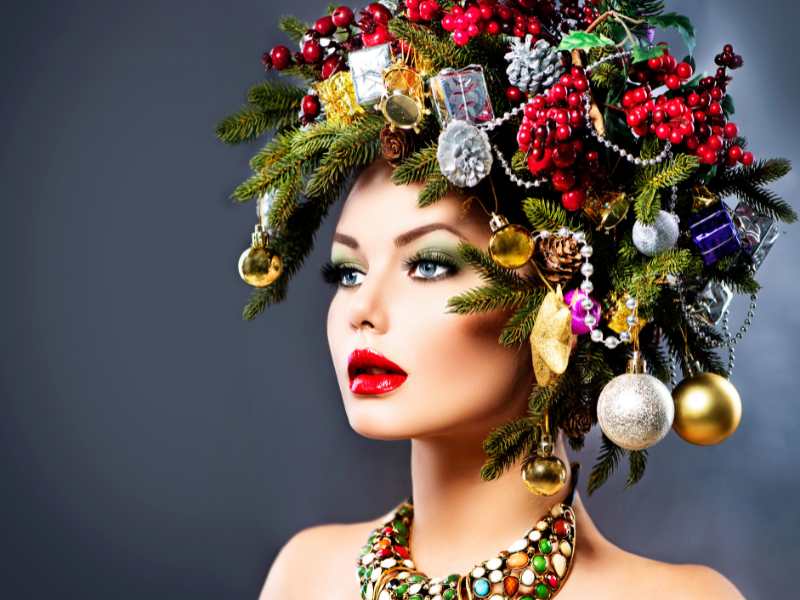 a-woman-wearing-a-decorated-hairstyle-with-xmas-accessories