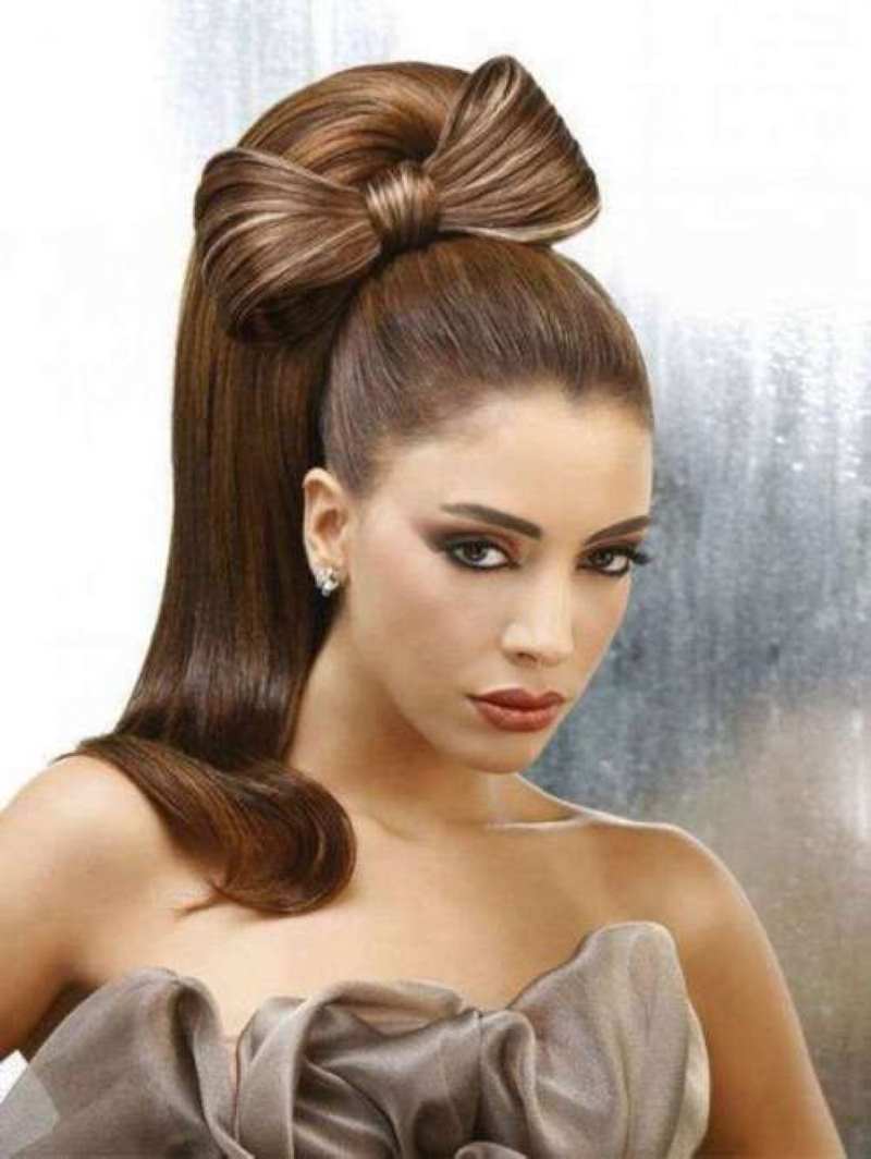 a-young-woman-with-a-high-pony-tail-with-bow