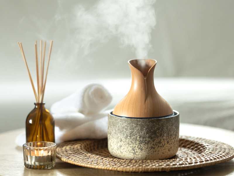 aroma-diffuser-on-brown-tray