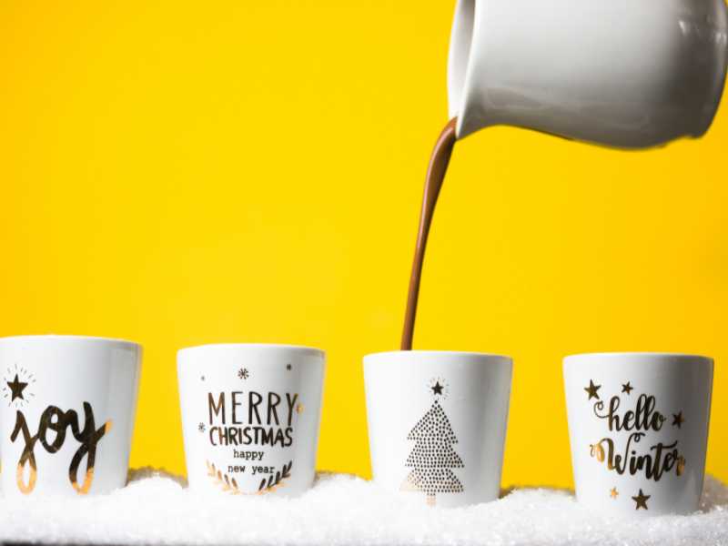 four-set-of-customized-mugs-on-a-yellow-background