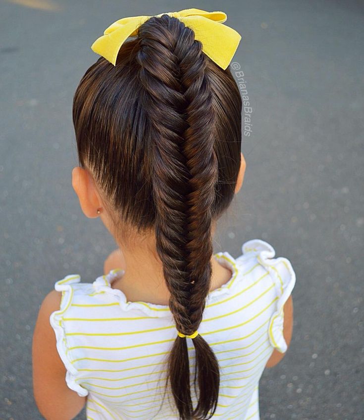 girl-on-sleevless-white-top-with-fishtail-hairstyles-for-kids