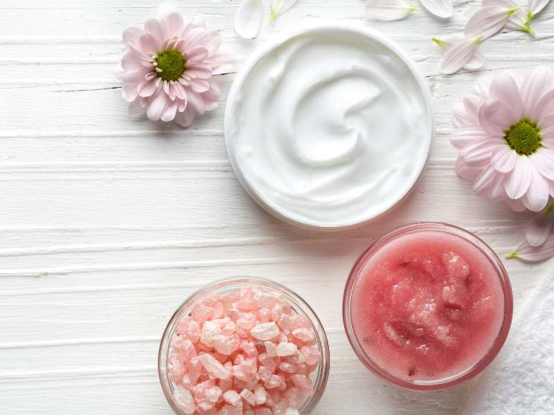 white-and-pink-body-scrubs-on-a-whte-table