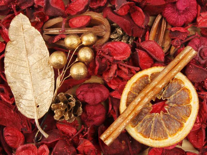 a-red-potpourri-with-gold=leaf-and-bell