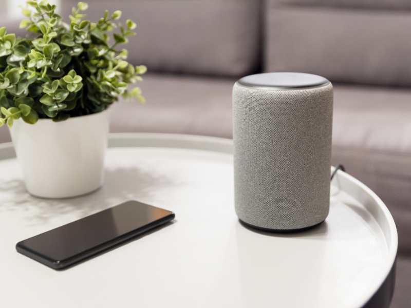 a-smart-home-speaker-on-a-white-table-one-of-the-best-Christmas-gift-ideas