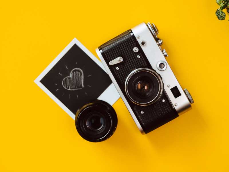 vintage-polaroid-camera-on-a-yellow-background