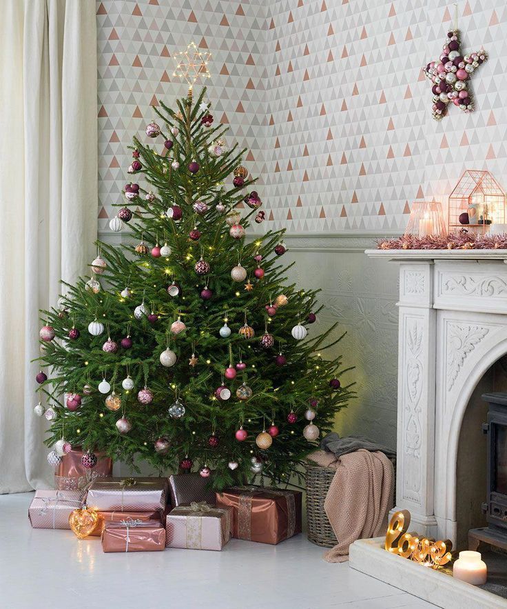 a-green-Christmas-tree-set-up-close-to-the-window