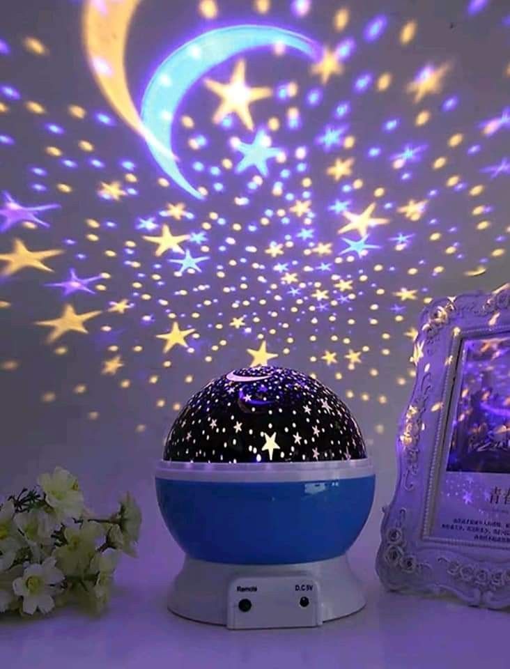 a-star-led-projector-with-yellow-purple-stars