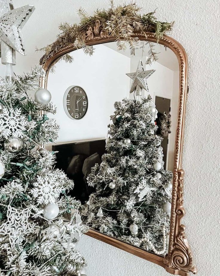 a-white-green-Christmas-tree-in-front-of-a-mirror