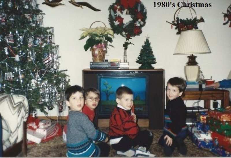 four-kids-in-front-of-1980-1990-Christmas-tree-decor